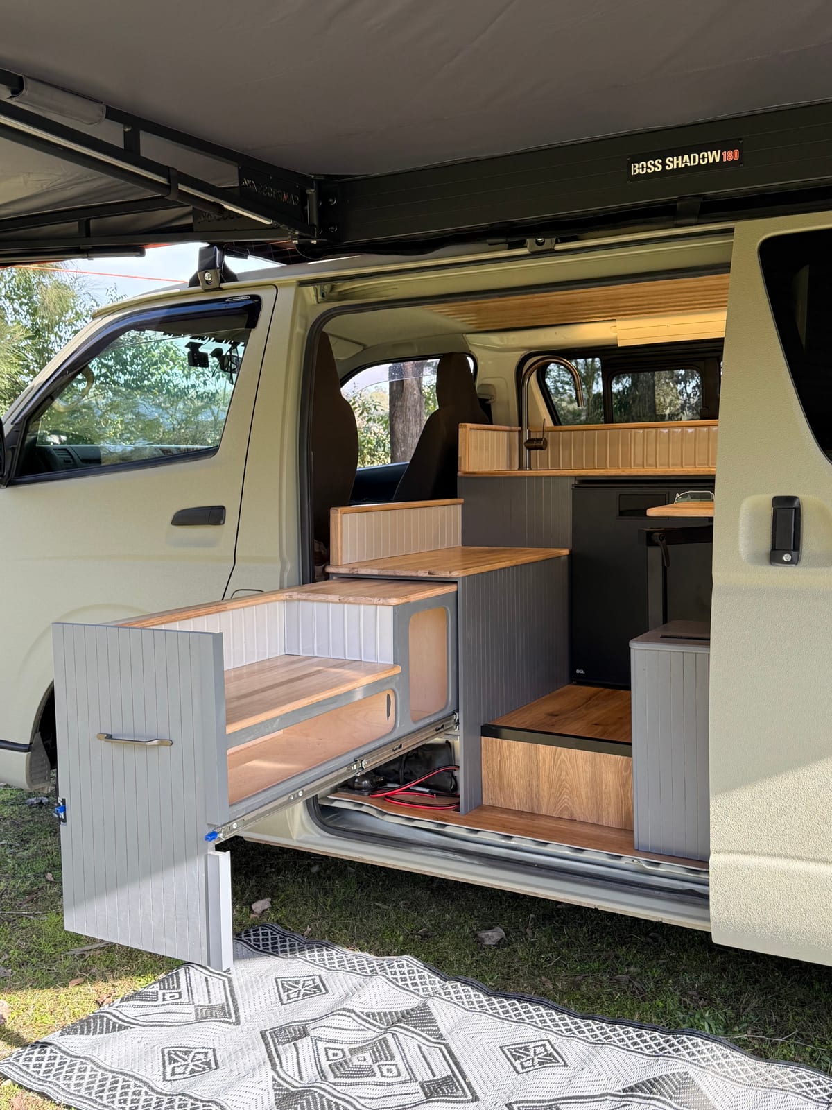 Khaki 4&times;4 Hiace &mdash; Cabinetry through the side door