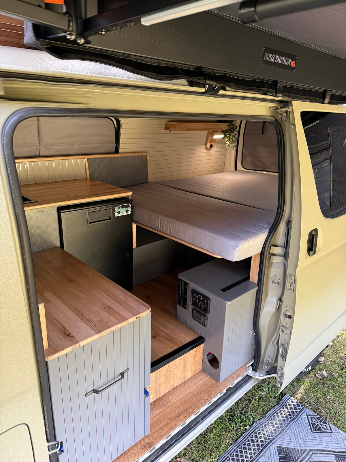 Khaki 4×4 Hiace — Timber bench and fridge slide