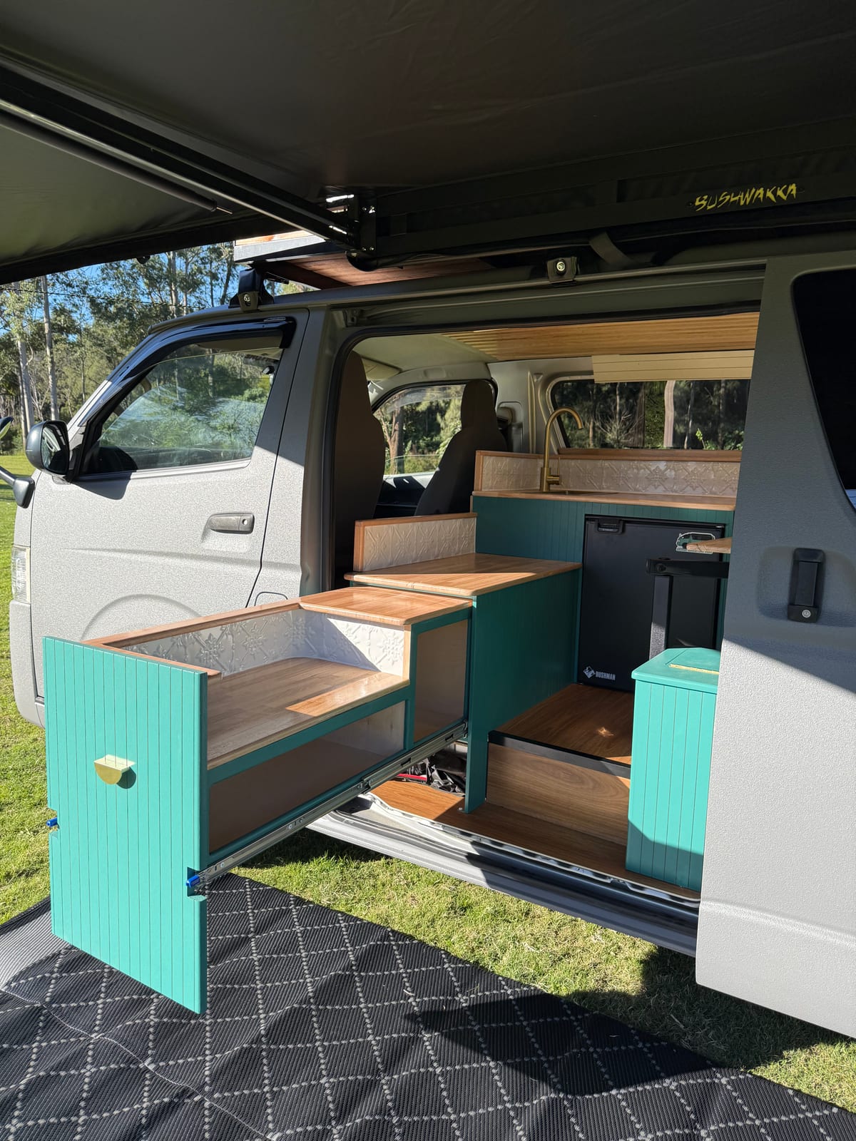 Teal Galley Hiace &mdash; Teal doors open through the side